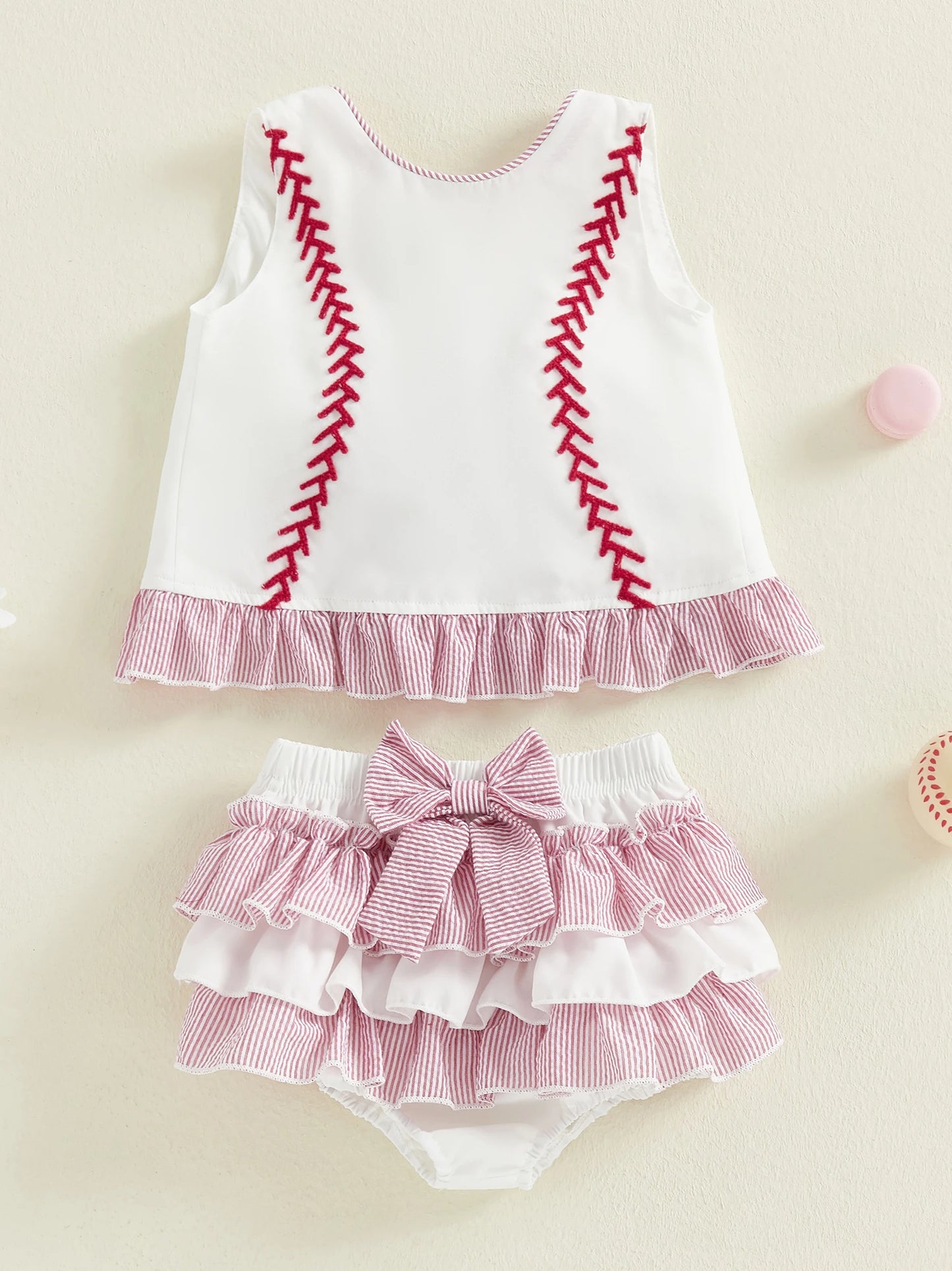 Discover a playful, comfortable outfit your little one will love for everyday adventures. This two-piece set pairs a stylish ruffle tank top with embroidered shorts for effortless charm and cute mobility.