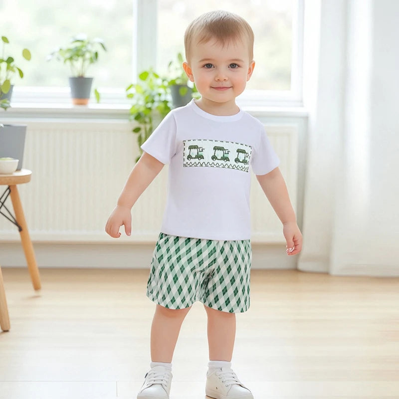 You’ll love dressing your little one in this adorable infant boy tee and checkered shorts set, perfect for hot weather outings.