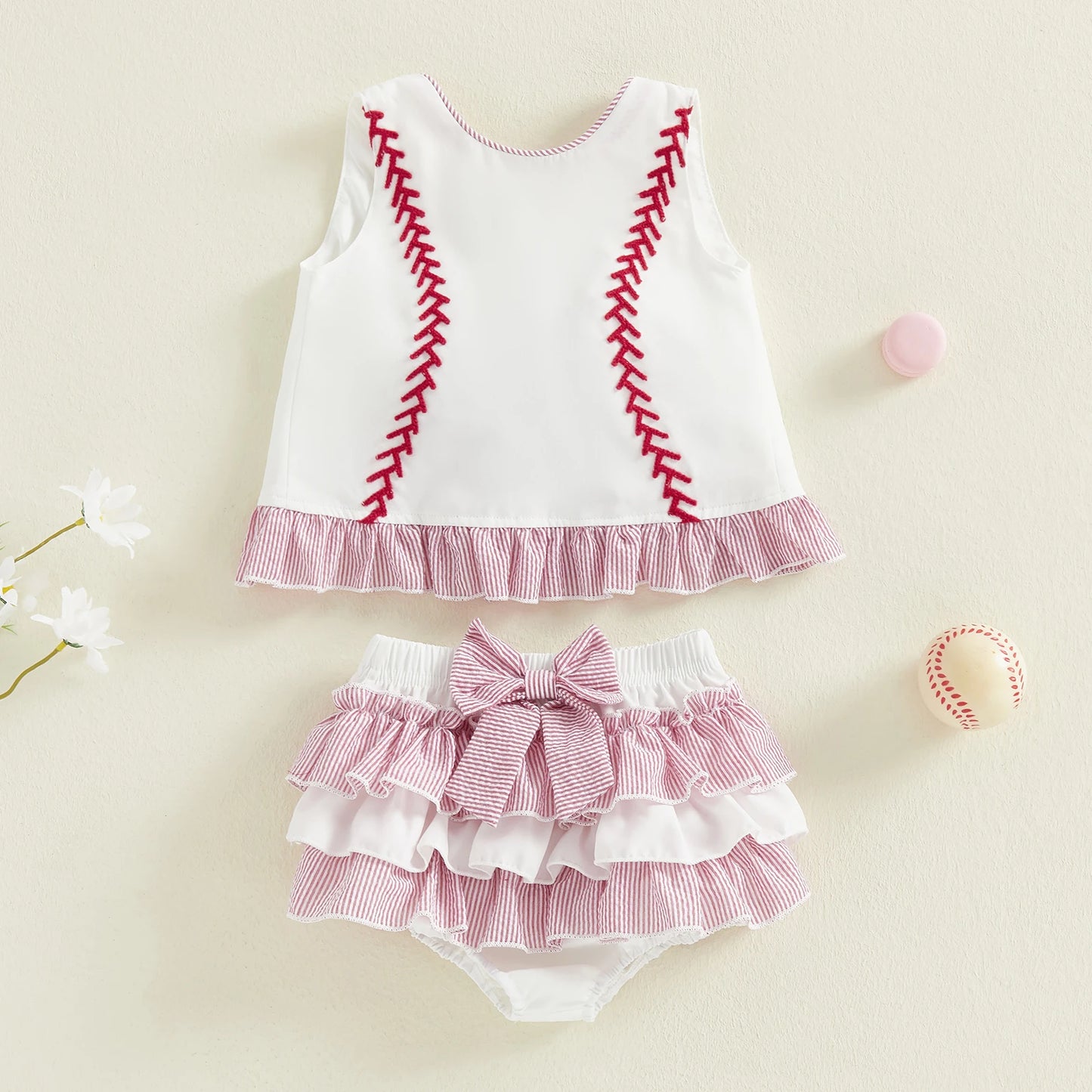 Discover a playful, comfortable outfit your little one will love for everyday adventures. This two-piece set pairs a stylish ruffle tank top with embroidered shorts for effortless charm and cute mobility.