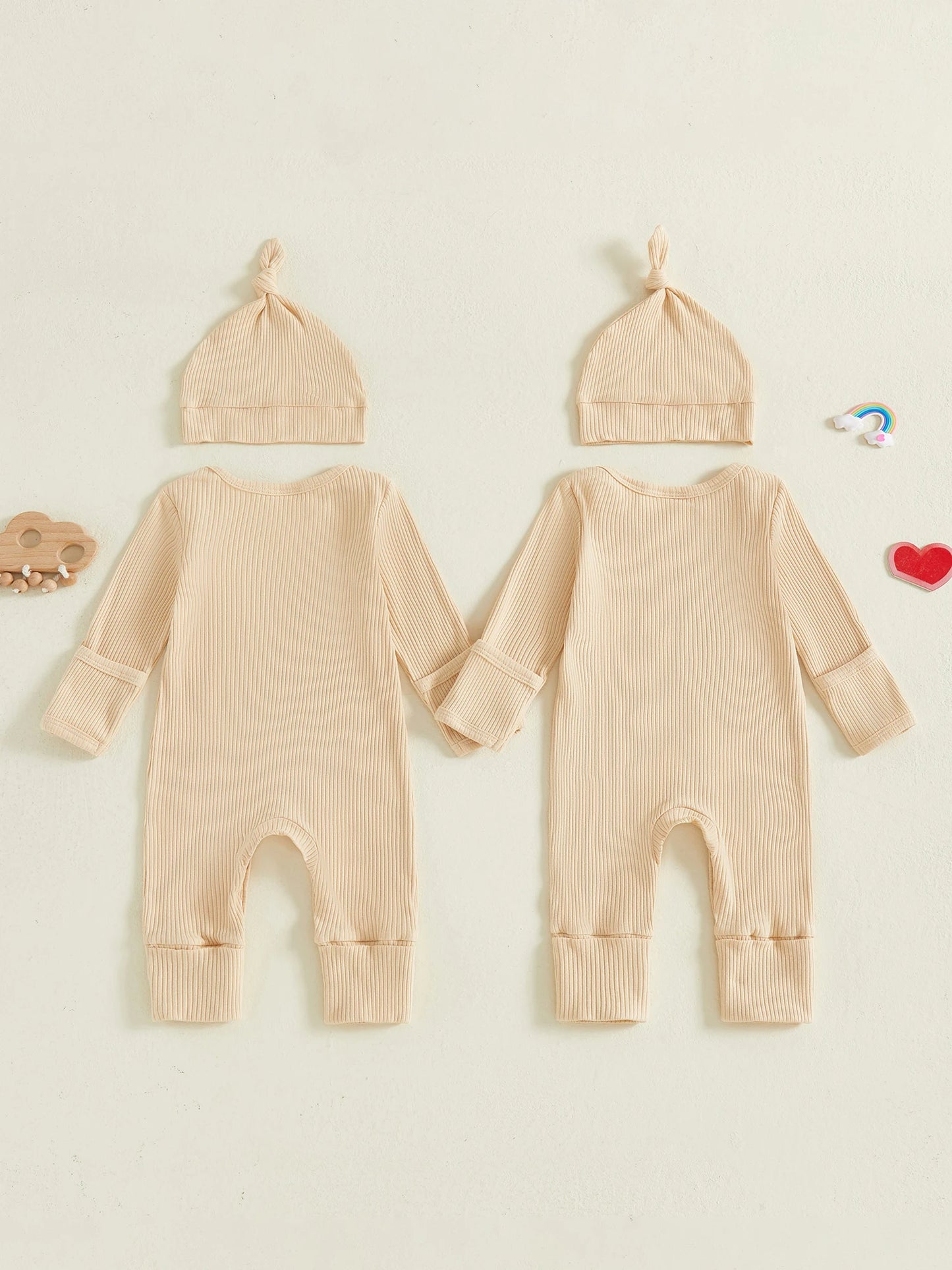 Cherish every twin moment in a coordinated, comfy outfit that fits snugly from newborn days onward and keeps them cozy through long car rides, naps, and cuddles.